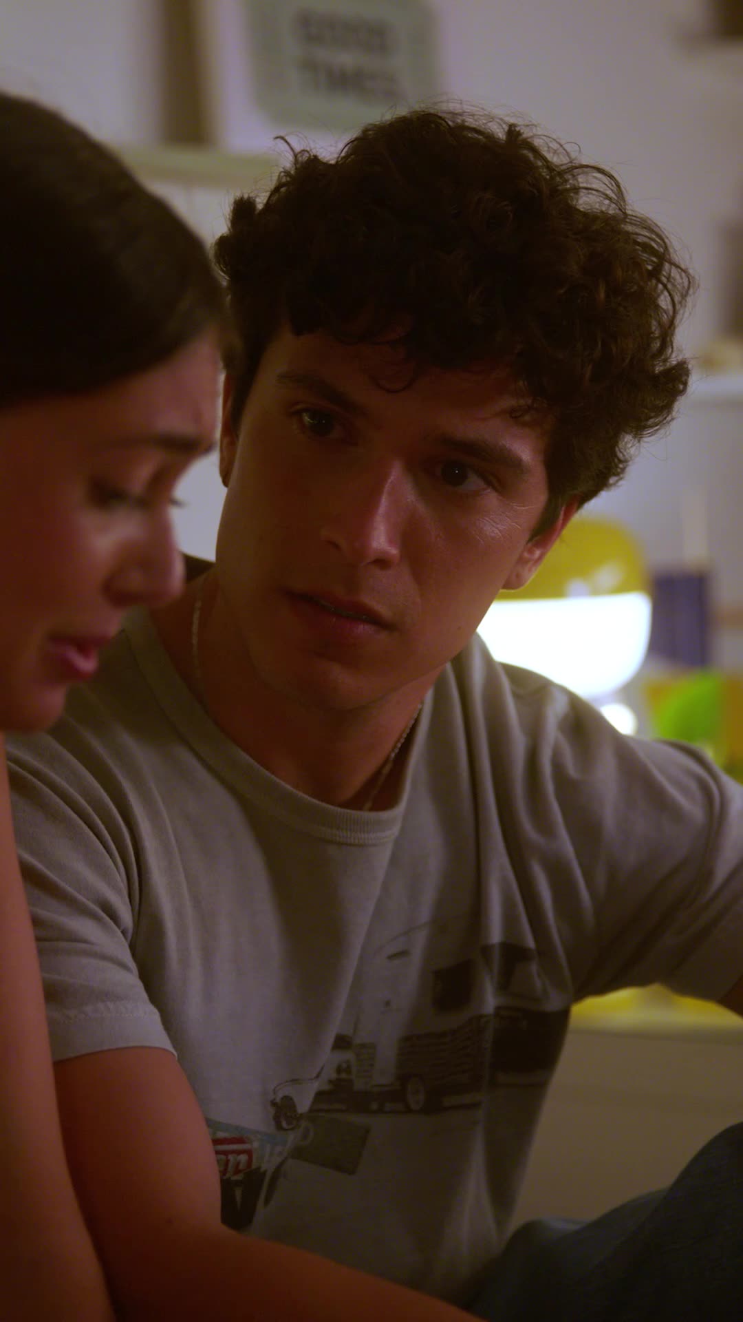 Strings Attached — a young man looking intently at someone off-camera