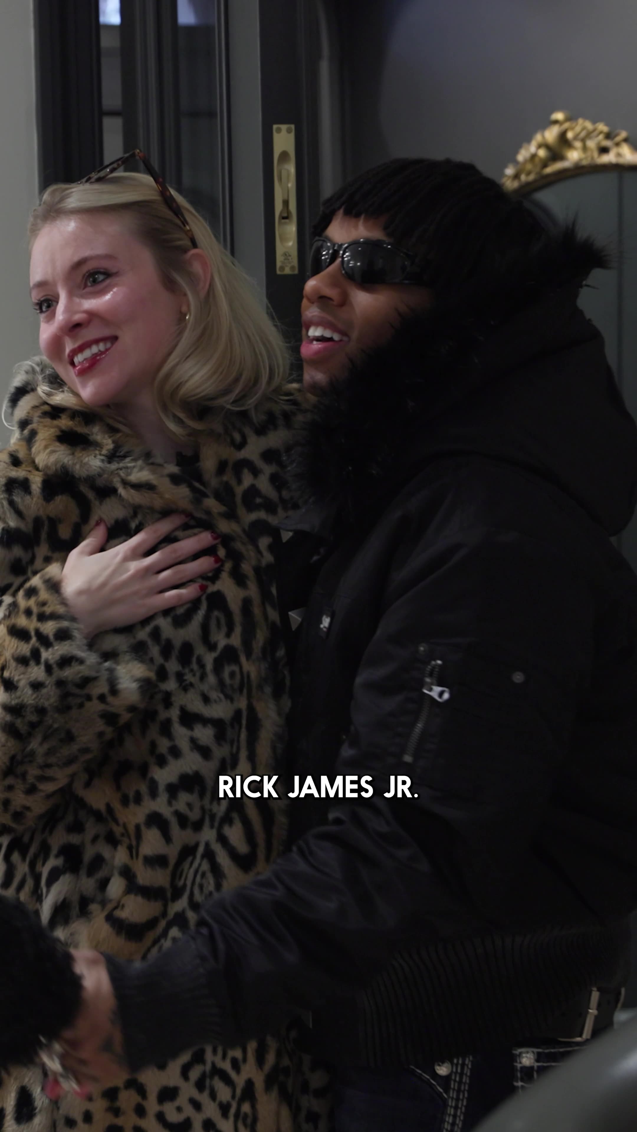 Selling Skylines — a woman and Rick James Jr. smiling together